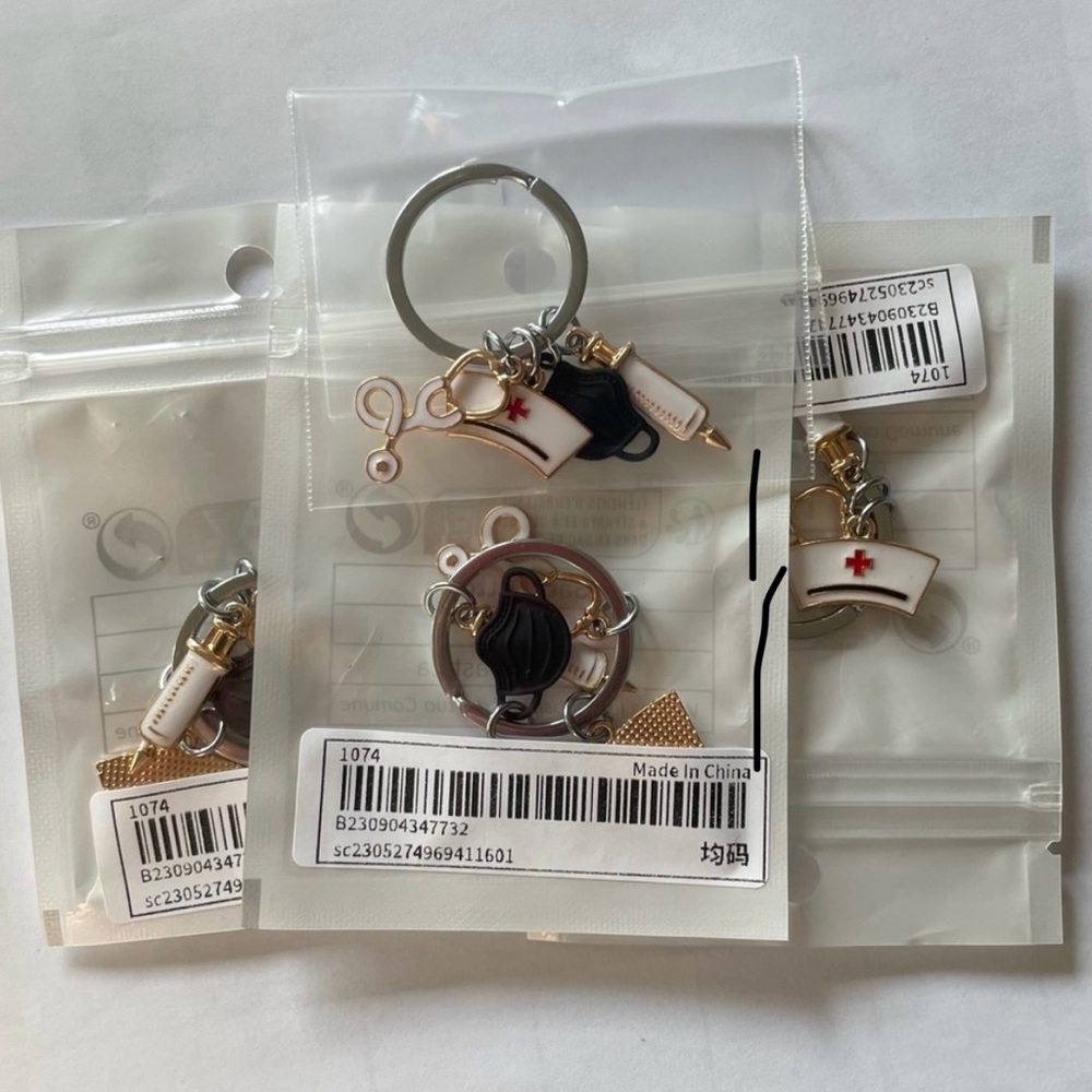 Key Chain New Lot of 4 Nursing Fun Charms Key Ring
Nursing Cap Stethoscope Mask